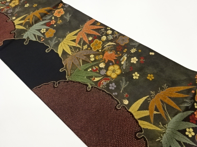 雪輪に笹・梅・宝尽くし模様織出し袋帯